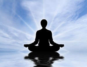 bigstock-Human-silhouette-meditating-ov-14446880
